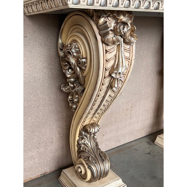 Dramatic Hollywood Regency Palm Leaf console lacquered in eye catching almond latte lacquer with a beveled edge marble...