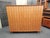 A very beautiful china and linen cabinet by Rudolf Frank. Designed in 1955, manufactured by Erwin Behr, Germany. The...