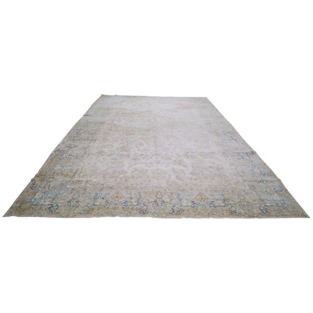 Hand-knotted with care using traditional rug-making techniques, this wool rug blends timeless craftsmanship with a modern...