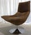 I’m selling a gently used suede leather and chromed tulip base swiveling lounge chair, Hopper Bucket style, with a deep...