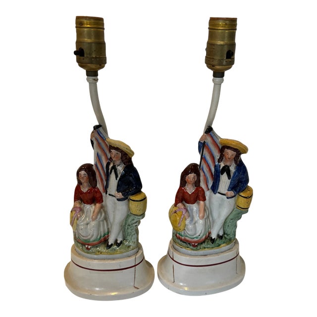 Pair of Mid Century Staffordshire Lamps Featuring a Sailor and His Maiden or Sweetheart For Sale