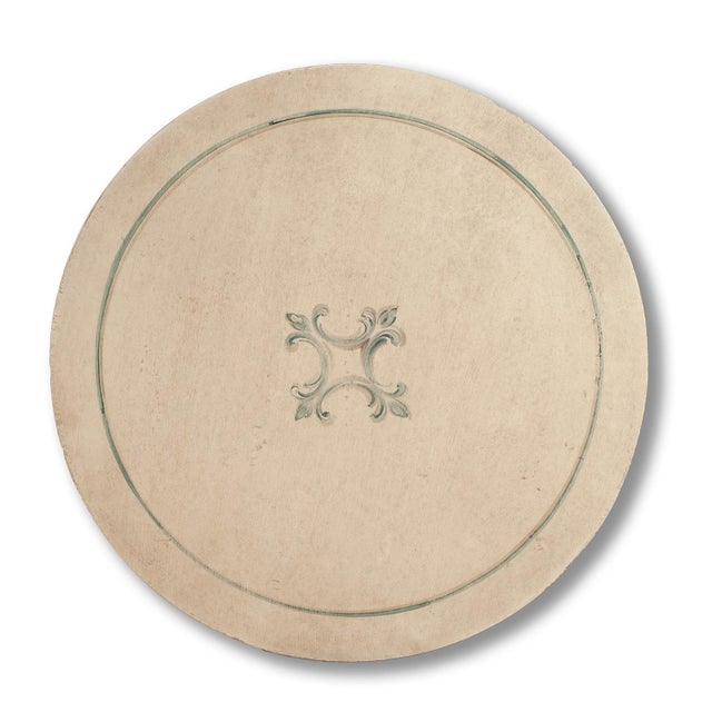 Handcrafted in Italy, this round accent table features a hand-painted floral design at the center of the top, framed by a...