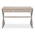 Crossed supports recall the portable forms of officers' furniture and give the writing surface a distinct stance. Between...