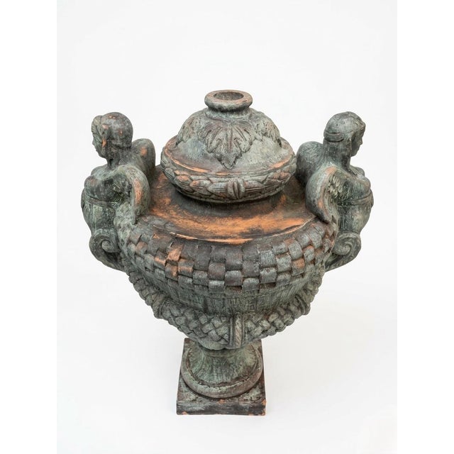 This impressive 32-inch-tall lidded urn is a masterclass in Neoclassical design, perfectly suited for high-end...