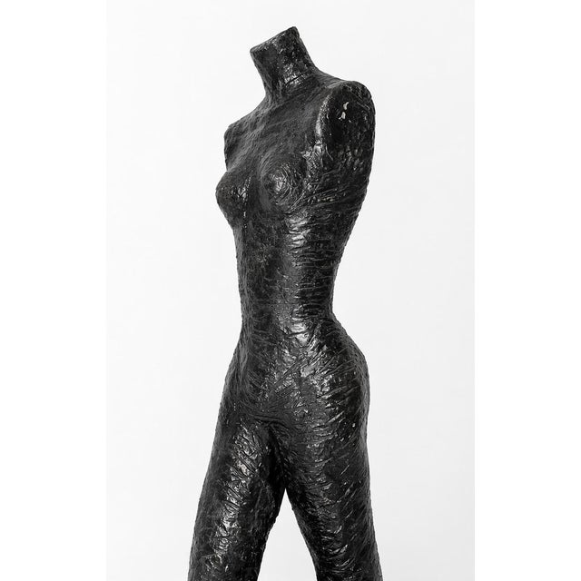 Contemporary piece in the style of Giacometti. Striking Giacometti-style “Walking Lady” sculpture, standing approximately...