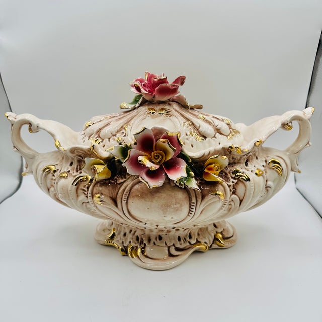 This is a vintage Italian Capodimonte porcelain soup tureen with a lid. It features intricate hand-painted floral...