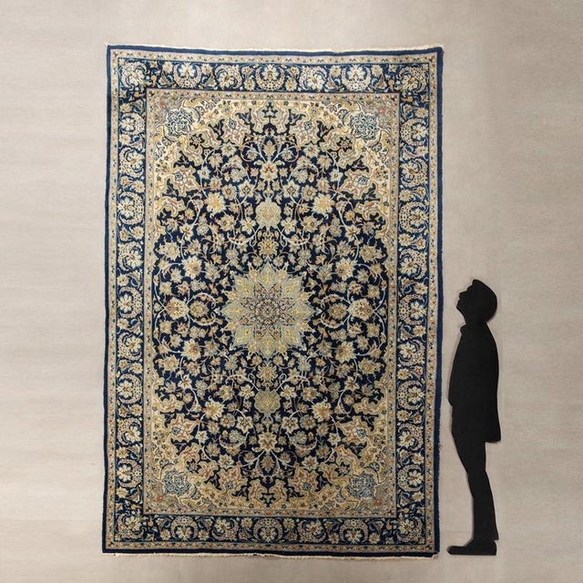 Nain rug in cotton and wool, hand-made, large knot. This piece is attributed to the mentioned designer/maker. It has no...