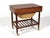 This little sewing table by Ejvind Johansson for FDB Møbler is handsome and useful. Clad in beautiful rosewood, the top...