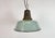 Industrial petrol enamel pendant light made in Poland during the 1960s. White enamel inside the shade. Cast iron top. The...