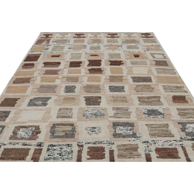 Hand-knotted in wool and silk, this 8x10 contemporary Moroccan style rug features a ribbed texture and geometric patterns...