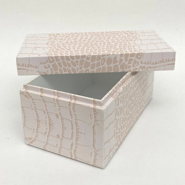 This beautiful handmade keepsake is made of painted wood in white. It is wrapped in vinyl, digitally printed pink...