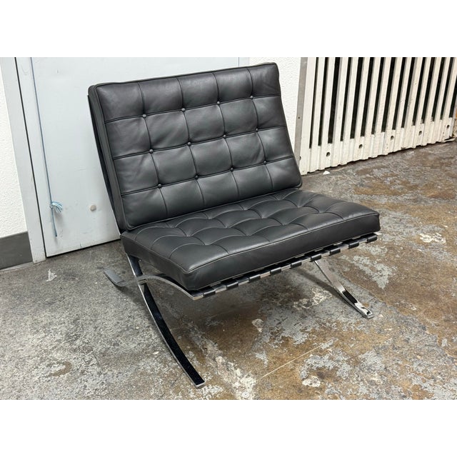 Design Plus Gallery presents a Seville Chair from Room & Board. A Barcelona‑style inspired reproduction. Inspired by the...