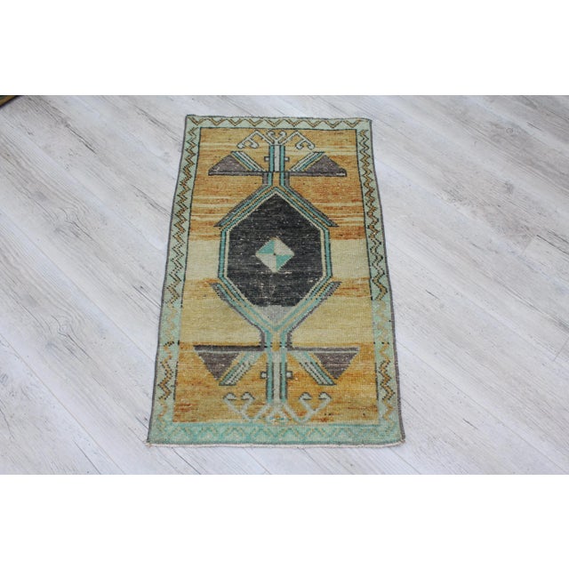This gorgeous hand knotted traditional Vintage Turkish Anatolian rug is approximately 60 years old in excellent vintage...