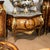 A magnificent French Louis XV-style commode showcasing exceptional decorative craftsmanship and timeless European...