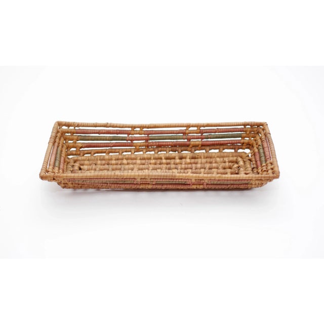Beautiful vintage loose woven tribal trinket basket. In excellent condition.
