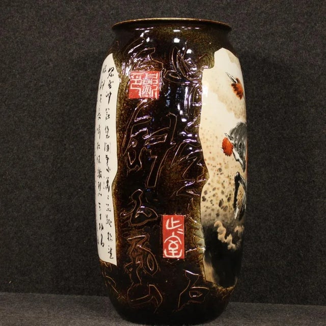 Chinese vase from the early 21st century. Jingdezhen ceramic work glazed and painted by hand with warrior on horse and...