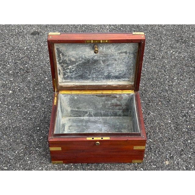 Handsome and exceptionally detailed late 19th C. Mahogany / Brass Humidor. Perfect Campaign style design, with the unusual...