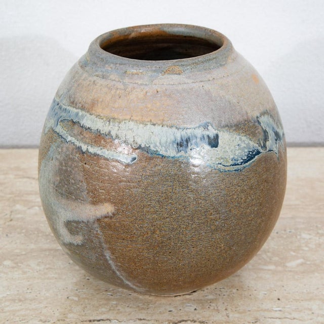 Vintage brown and blue ceramic pottery vase. Great in nearly any setting. Signed beneath.