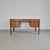 Danish Teak Desk by Domino Møbler, 1960s This elegant teak desk was produced in Denmark in the 1960s by Domino Møbler. A...