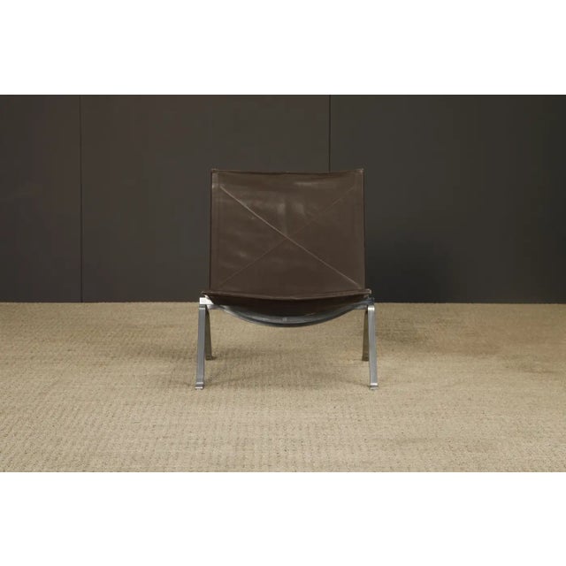 This exceptional all-original early-production PK22 lounge chair by Poul Kjærholm for E. Kold Christensen represents a...