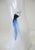 A large stunning handblown art glass vase with a floating woman design titled " Catwalk" by artist Kjell Engman. Thie...