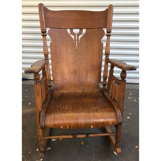 Early 20th Century Antique Rolled Seat Rocking Chair | Chairish