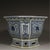 This striking antique porcelain planter features a hexagonal form with a flared rim, resting upon a matching pedestal...