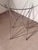 Elegant folding side table by Bjart , featuring a sculptural geometric base constructed from slender chrome-plated metal...