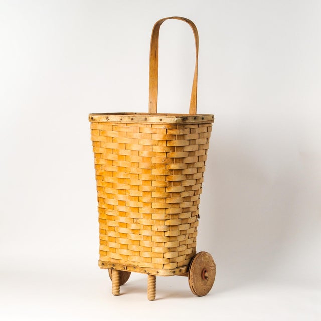 Beautiful vintage woven market cart, appears handmade. Sturdy functioning basket, with a couple breaks in the weave, most...