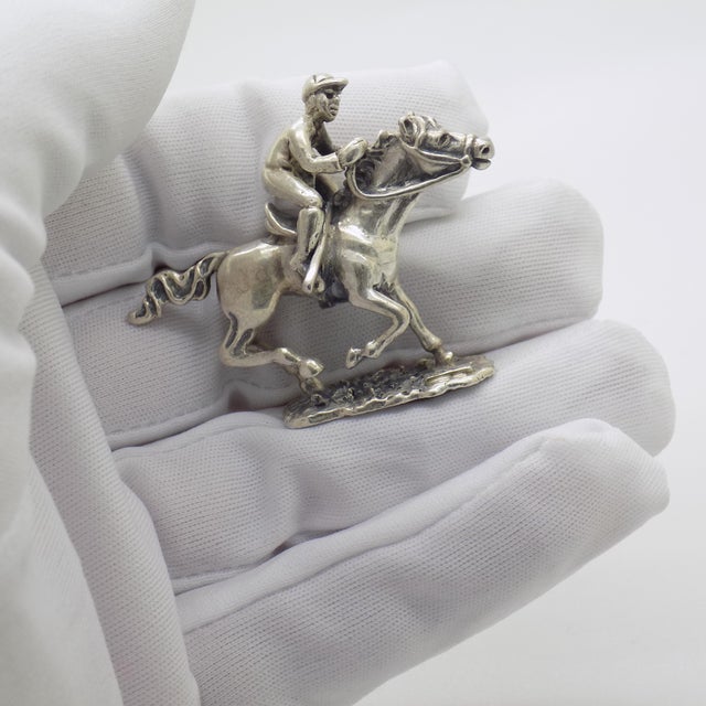This vintage silver figurine depicts a racing horse (cavallo da corsa) in motion. Handcrafted in arezzo, tuscany during...