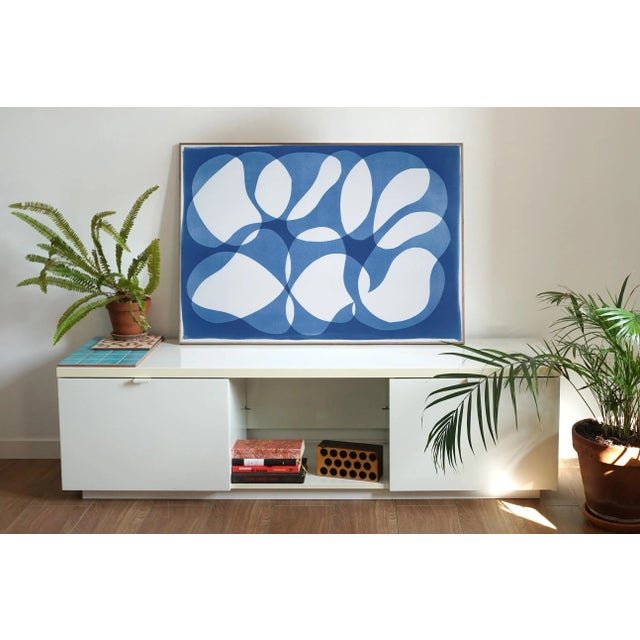This is an exclusive handprinted unique cyanotype that takes its inspiration from the mid-century modern shapes. It's made...
