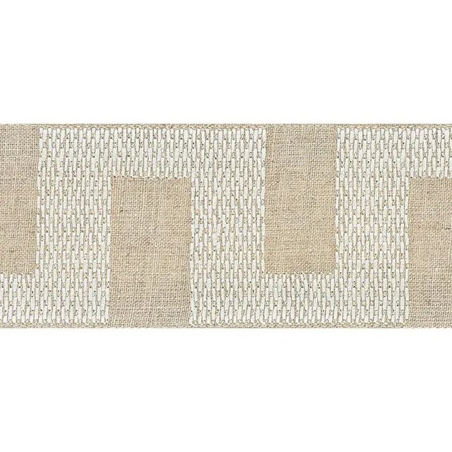 A charmingly relaxed linen tape with a geometric pattern that looks hand-stitched. Sold as a 2-yard minimum. Horizontal...