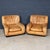A sumptuous pair of lounge chairs showcasing the refined craftsmanship and soft sculptural forms typical of rossi di...