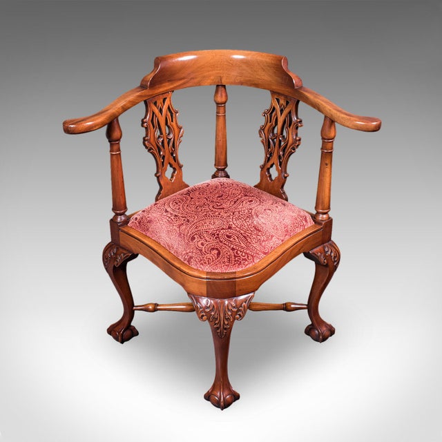 This is an antique corner armchair. An English, mahogany dressing seat in Georgia revival taste, dating to the late...