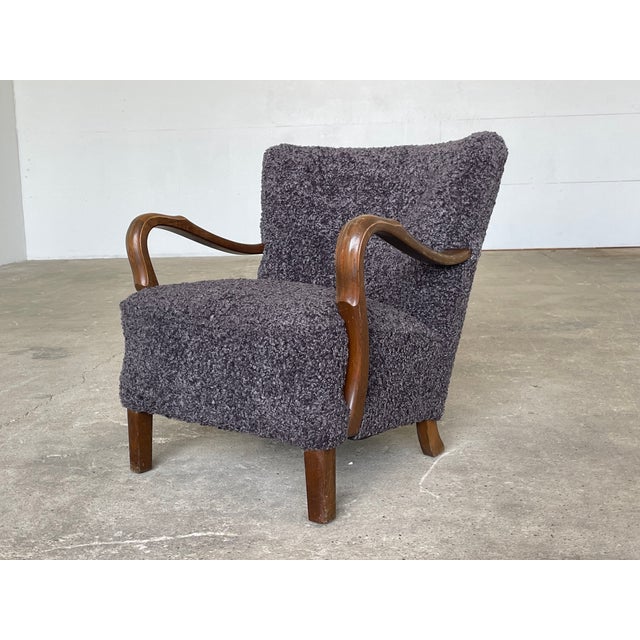 A beautifully proportioned Danish Art Deco lounge chair in the manner of Viggo Boesen — one of the most collectible and...