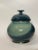 There's an abstract modern feel to this lidded ginger jar. The variation of colors from light to dark blue, to light green...