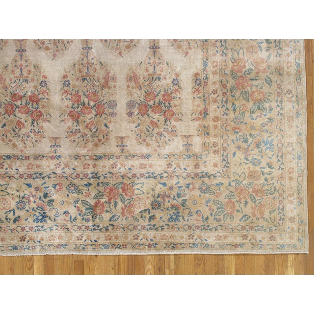 Antique Kerman carpet, 12 x 18'10" This master crafted Persian Laver Kerman carpet exemplifies the profound understanding...