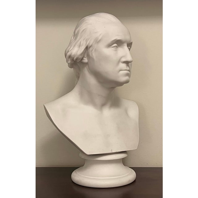 Antique 19th century English parian porcelain bust of president George Washington after Jean-Antoine Houdon. Mounted on a...