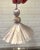 Handmade beaded key tassel in light neutral colors of ivory and taupe with cut velvet ruche. Details include: Satin...