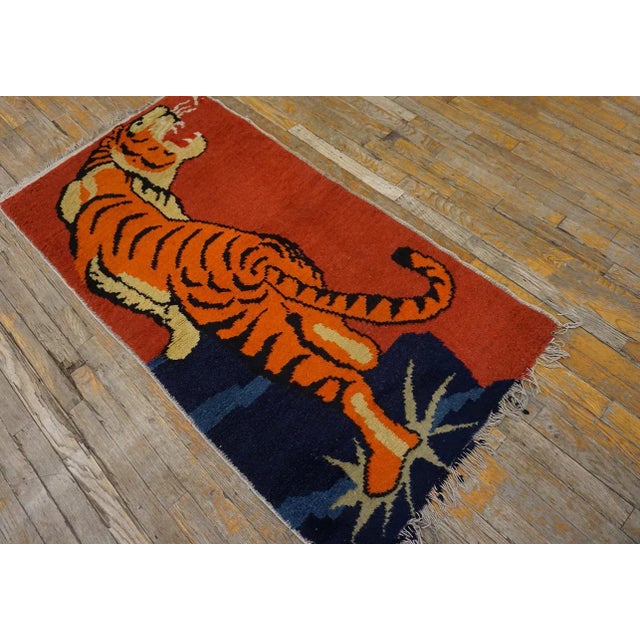 Vintage Chinese Tibetan Tiger Carpet 2' 8"x 4' 10" Yellow Vintage Chinese - Tibetan 1960s Rug, Circa Date: 1960s. This...