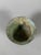 Archaic bronze vase on a pedestal from the Western Zhou Dynasty (1100-771 BC). The exterior walls are decorated with...