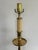 Tall brass candlestick lamp with carved wood base. Stately and masculine. Please see condition details noted. Most items...