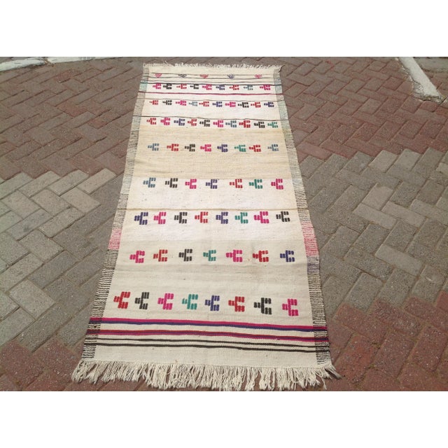 This beautiful, vintage, handwoven kilim is approximately 50 years old. It is handmade, of very fine quality wool and...