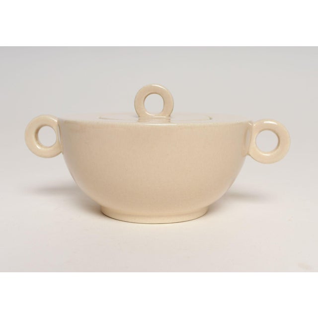 French Art Deco architectural glazed earthenware sugar bowl with lid in by Jean Luce, ca. early 1930s. Elegant, organic...