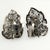 Vintage clip earrings crafted of silver plated filigree metal in a leaf design. They are also embellished with clear...