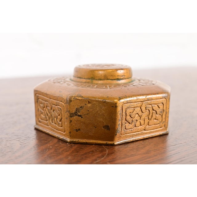 A gorgeous Arts & Crafts or Art Deco period "Zodiac" pattern gilt bronze inkwell By Tiffany Studios New York, USA, Early...