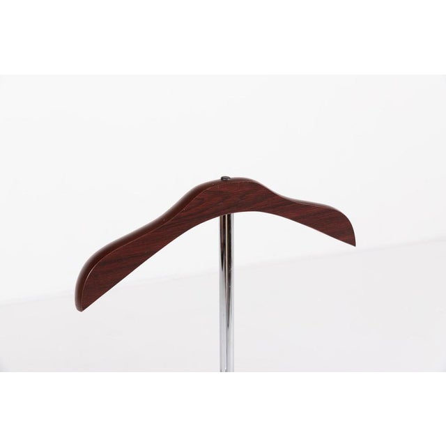 Vintage Italian clothes valet equipped with 2 clothing hangers.Condition Good, age related wear. I have official proof of...