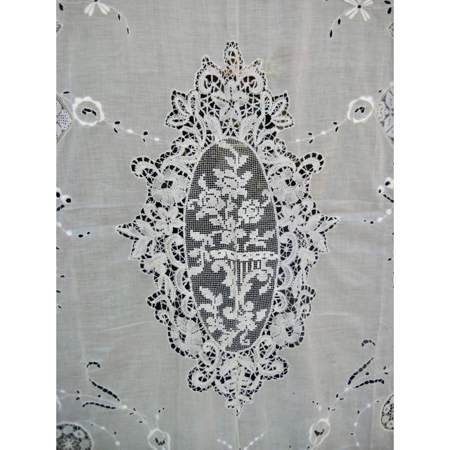 This french lace embroider sheer in cotton present a floral decor and purely lace design at the same time it is a lovely...