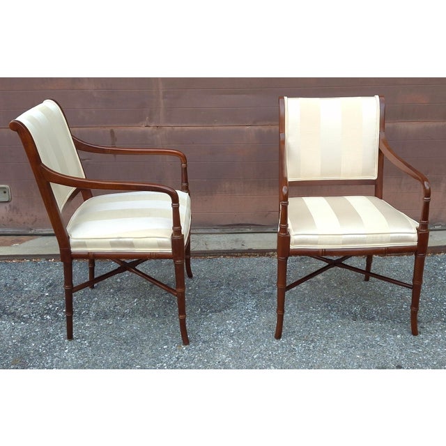 Pair of Hickory Chair Co Regency Style Mahogany and Cream striped Upholstered Armchairs Dimensions: 23.5" in width, 24" in...