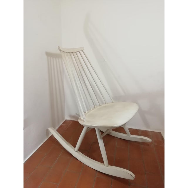 Mademoiselle rocking chair by Ilmari Tapiovaara. White color. Good original condition. Small amount of paint missing. I...